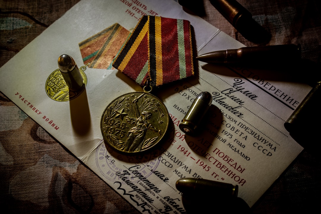 a medal and some other items on a table